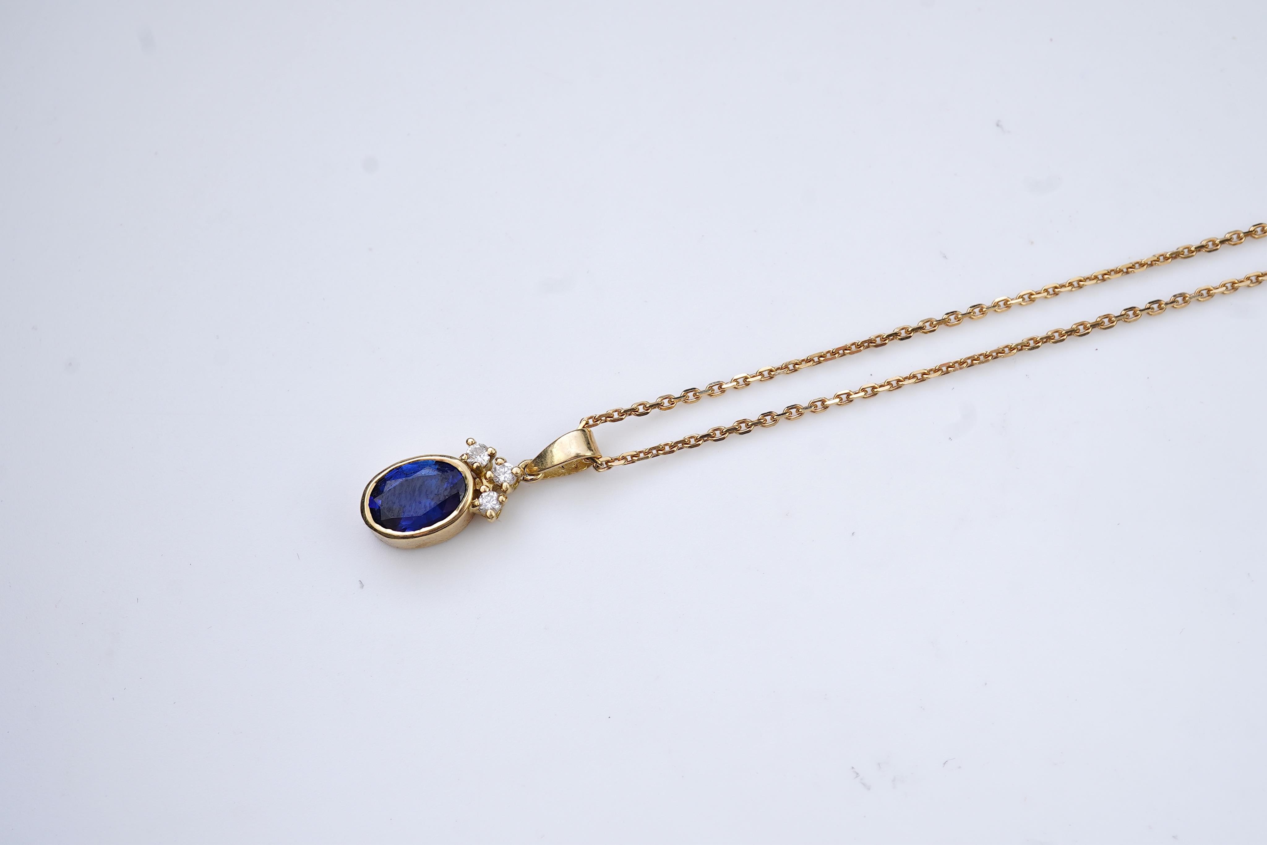 A sapphire and diamond pendant